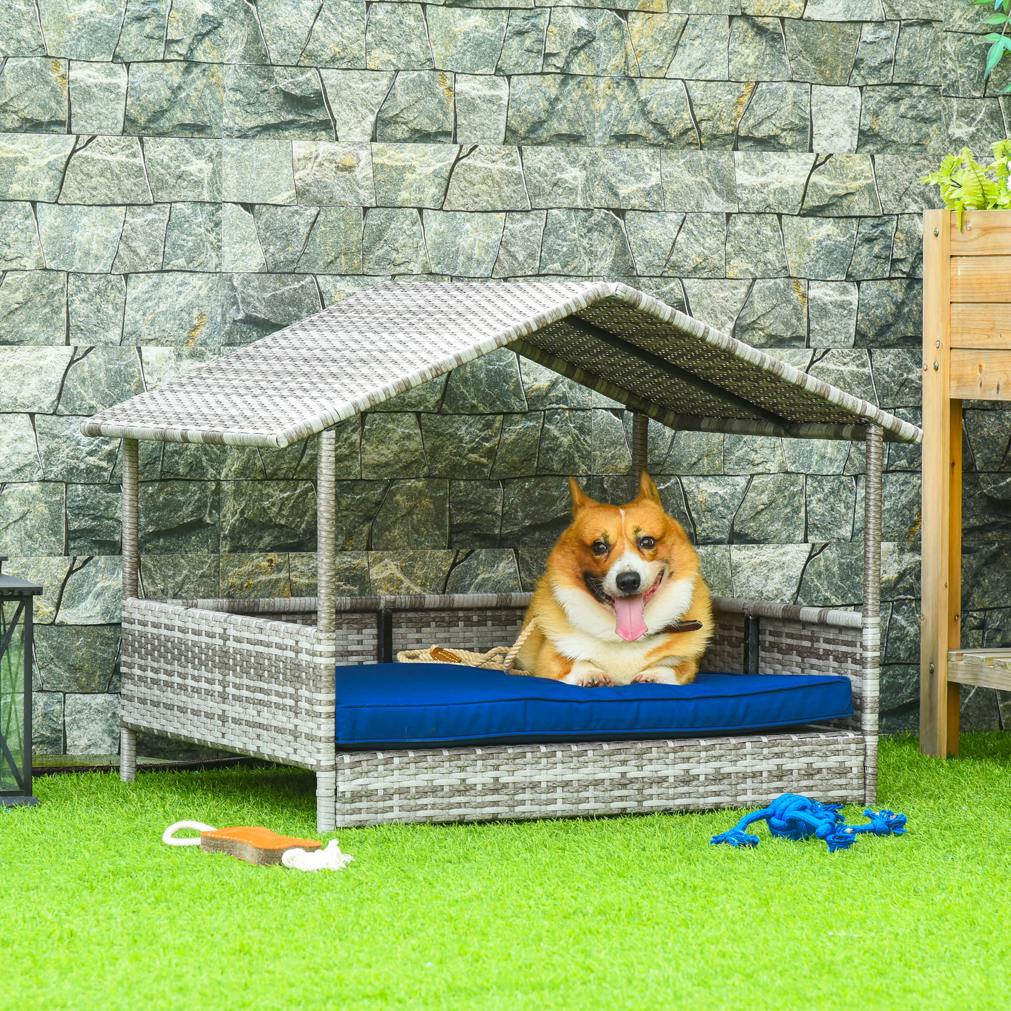 PawHut Elevated Rattan Dog House Outdoor with Canopy, Wicker Dog Bed with Water-Resistant Cushion, for Small and Medium Dogs Dark Blue