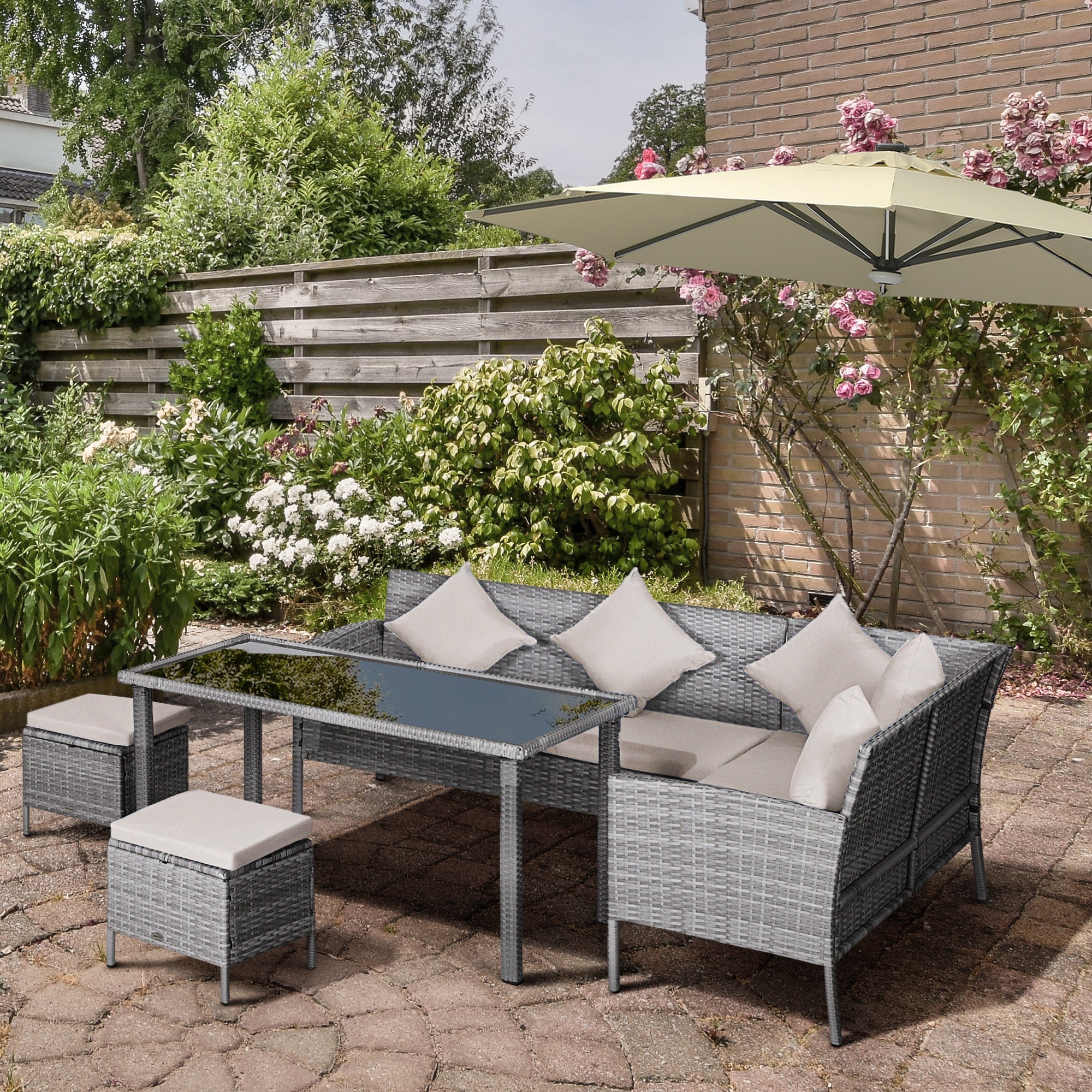 Outsunny 5 Pieces Wicker Patio Dining Set with Cushions, PE Rattan Corner Sofa Set Outdoor Conversation Furniture Set with Glass Top Dining Table, 2 Ottomans, Cream White