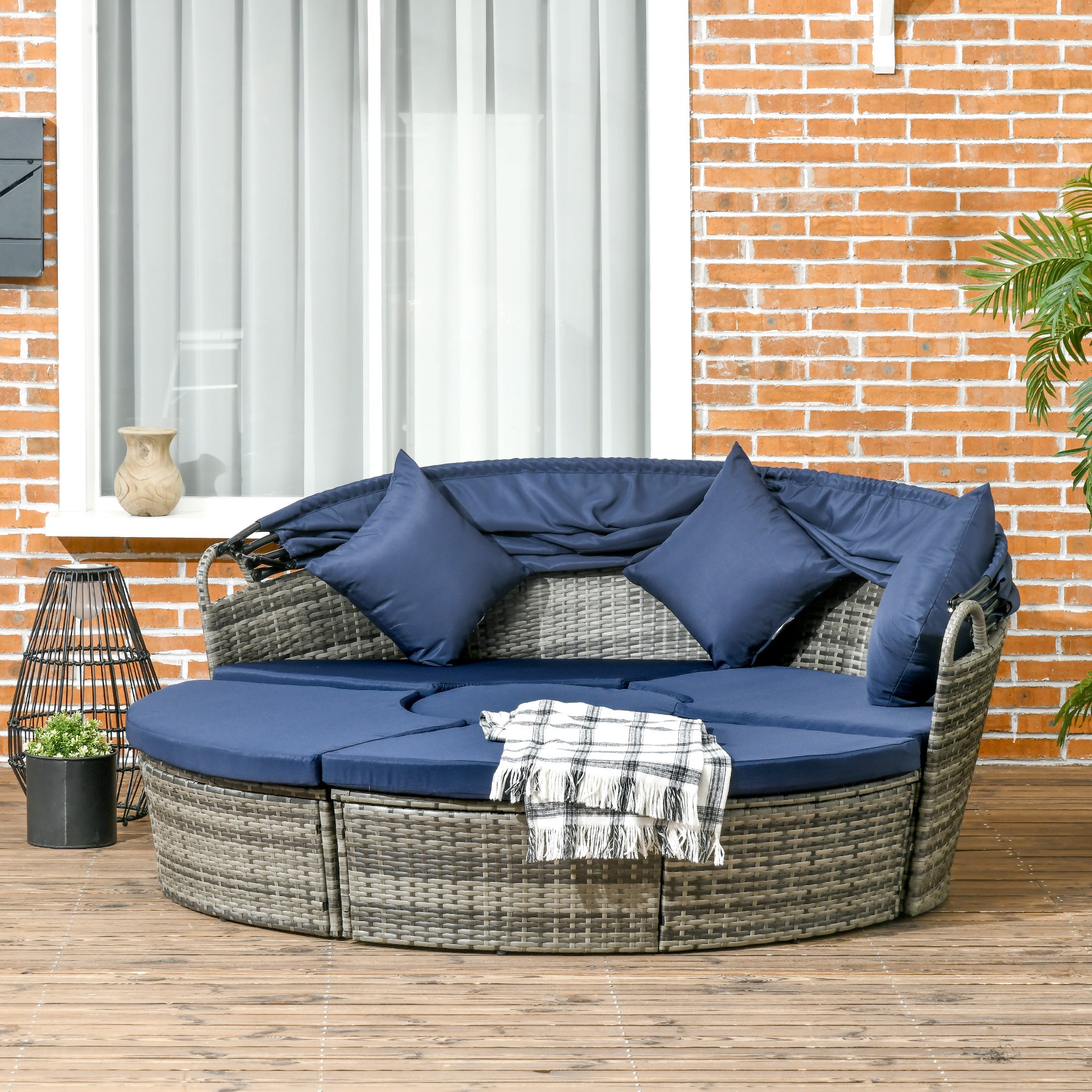 Outsunny 4 Pieces Outdoor Daybed with Retractable Canopy, PE Rattan Wicker Round Sofa Day Bed, Patio Sectional Conversation Furniture Set with Cushions and Pillows, Dark Blue