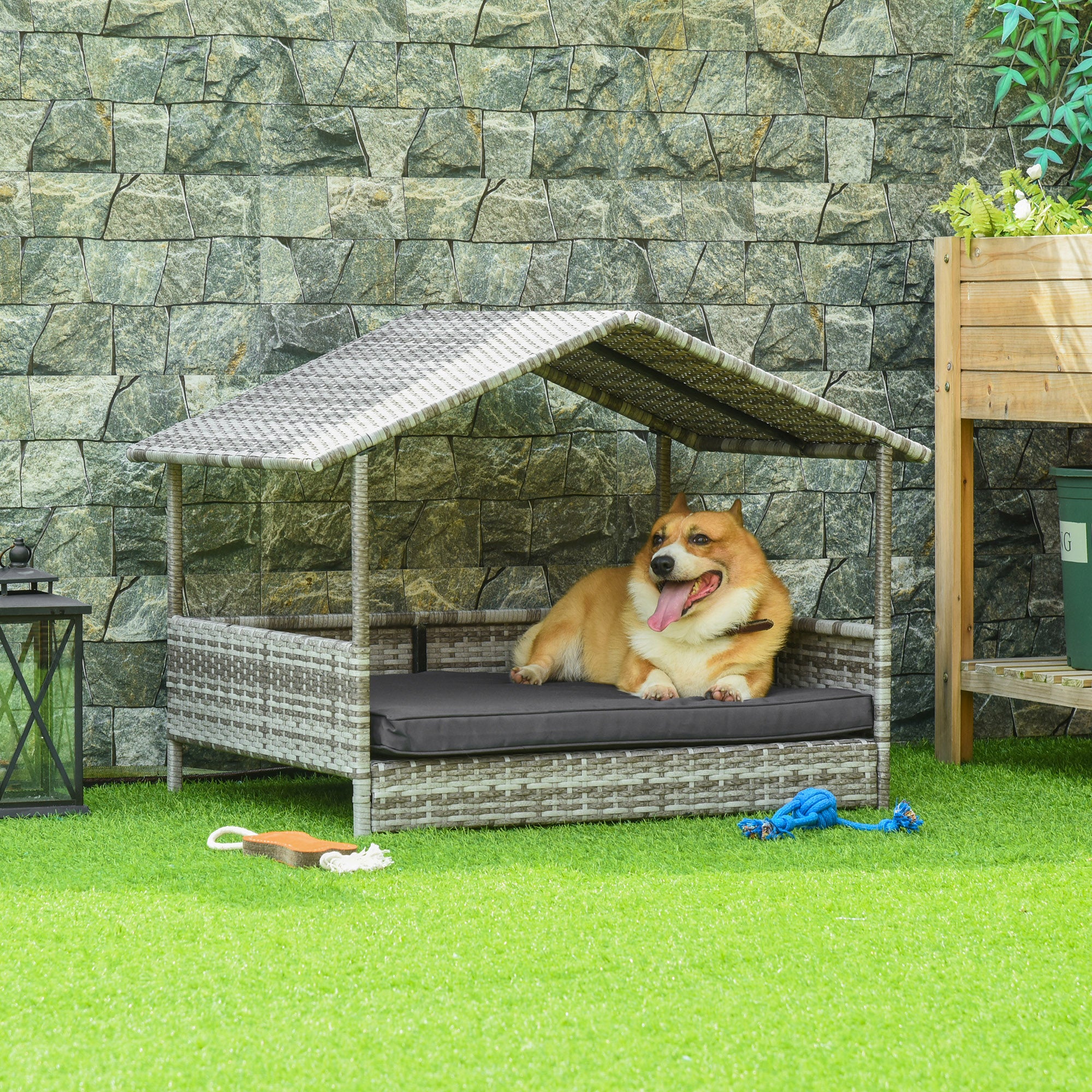 PawHut Elevated Rattan Dog House Outdoor with Canopy, Wicker Dog Bed with Water-Resistant Cushion, for Small and Medium Dogs Dark Grey